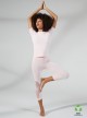 Set Yoga Rosa Pallido: T-Shirt + Legging Capri Slim con inserti traforati